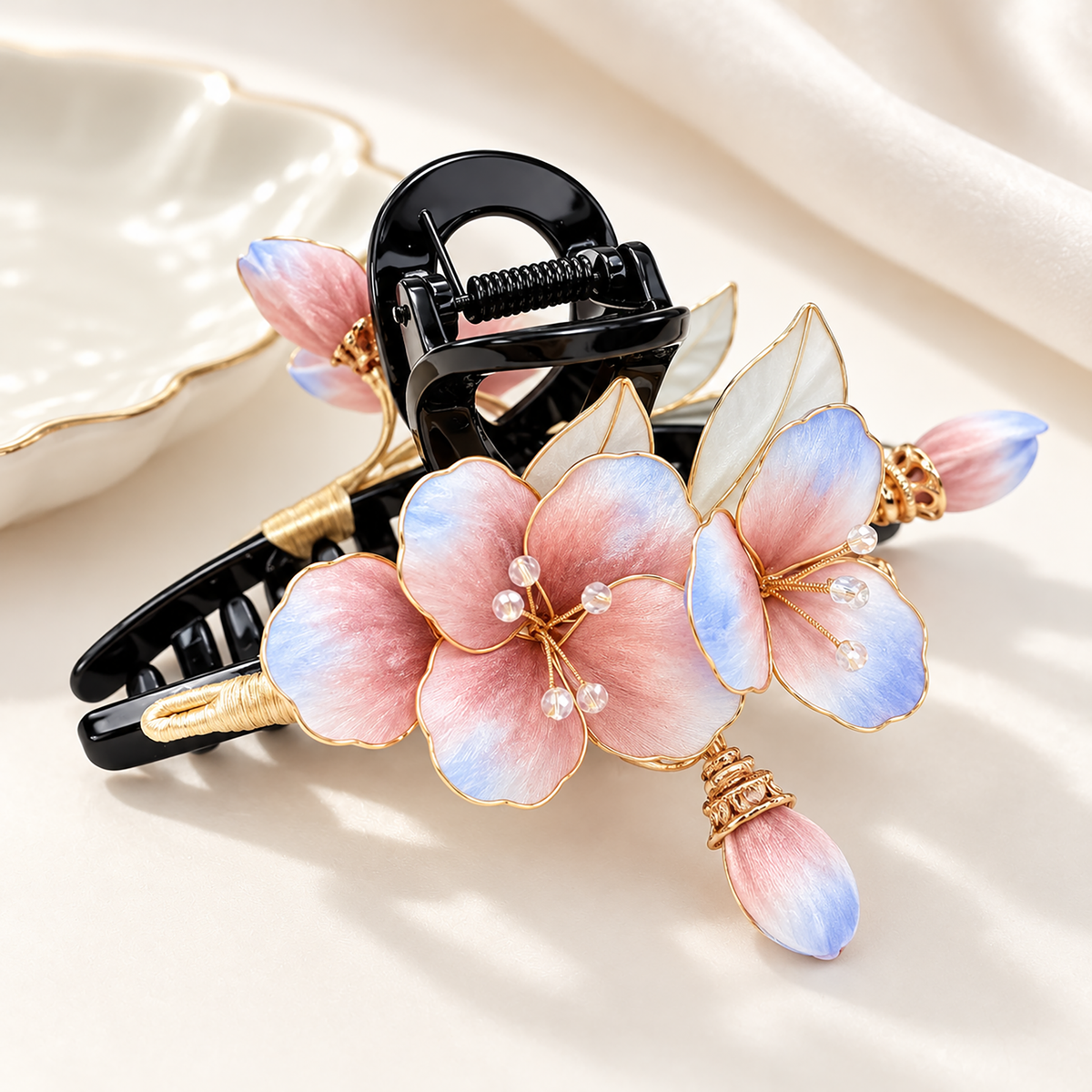 Peach cloud mulberry-silk Ronghua claw hair clip on cream fabric