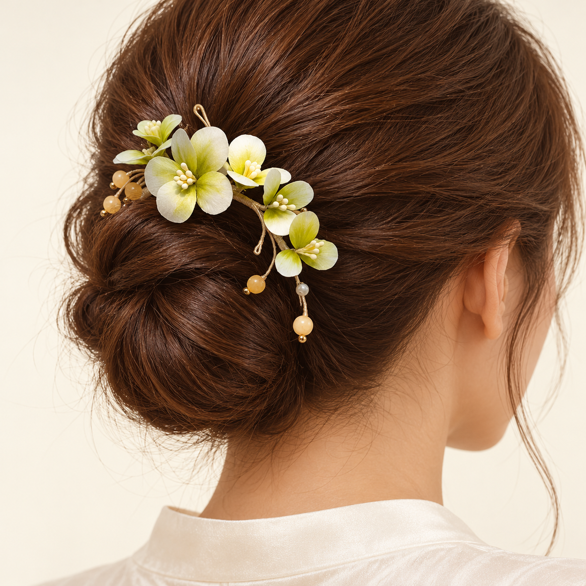 Green blossom Ronghua hair stick worn in a bun