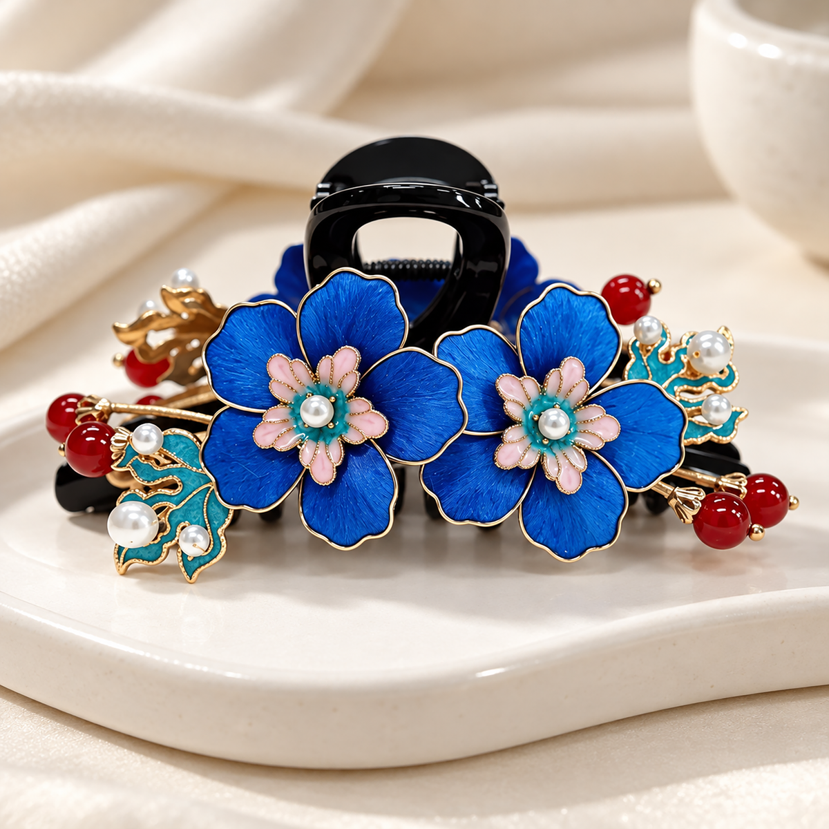 Twin Blue Blossom Ronghua claw clip detail with red bead accents