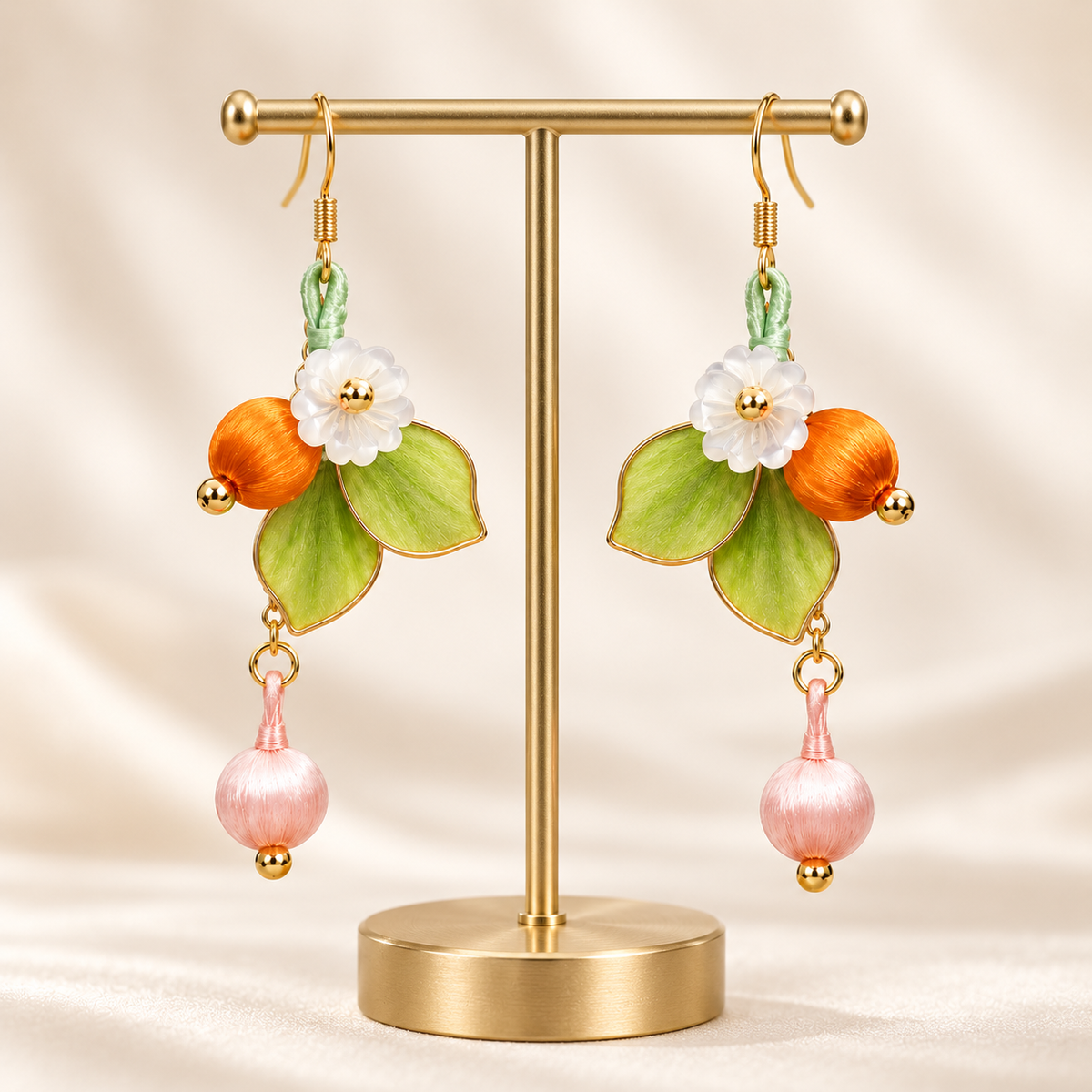 Qingguang forest blossom Ronghua drop earrings on a display stand