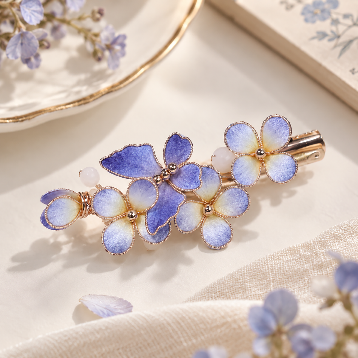 Blue Butterfly Blossom Ronghua hair clip on cream surface with gold-tone clip