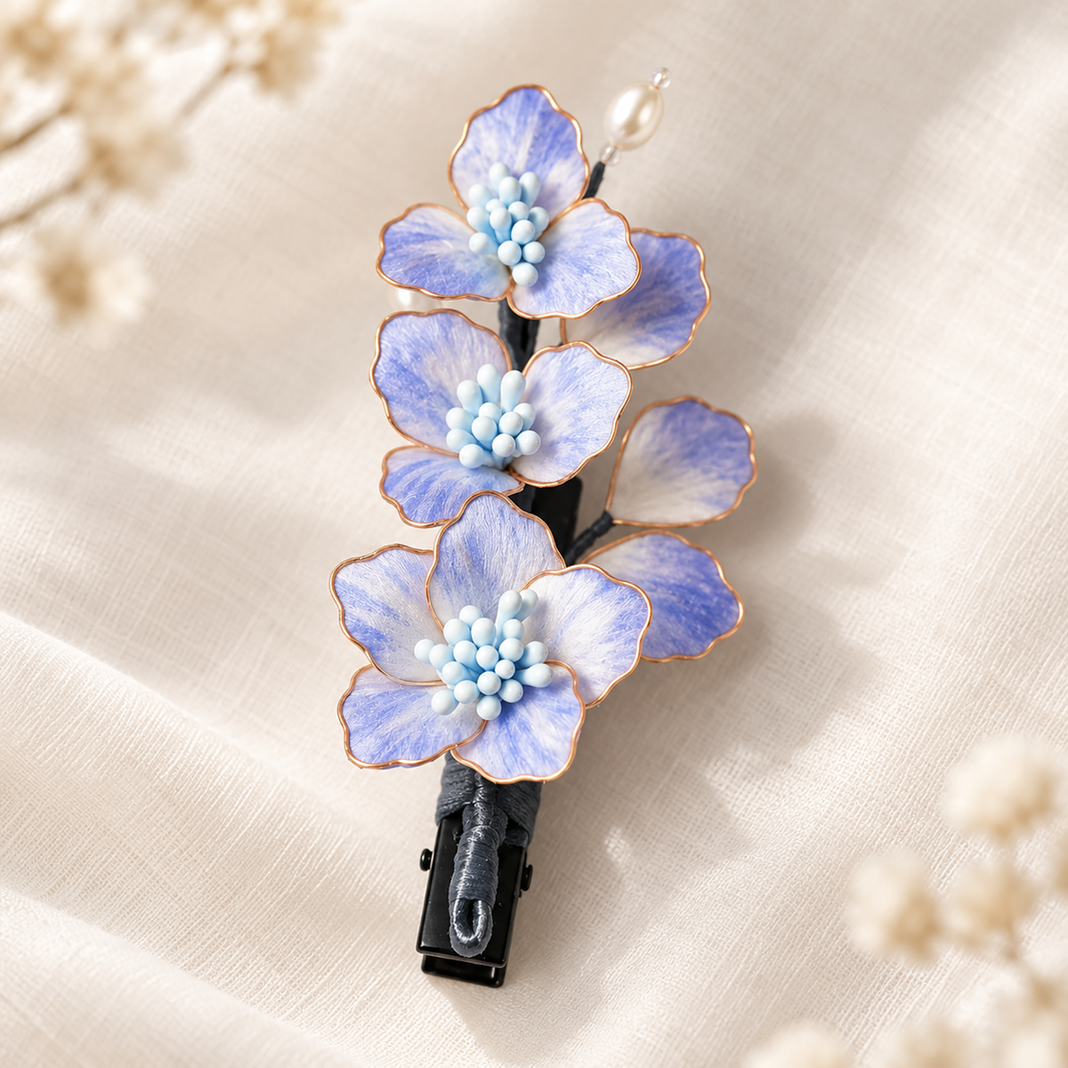 Vertical lavender Ronghua blossom spray on a black alligator hair clip