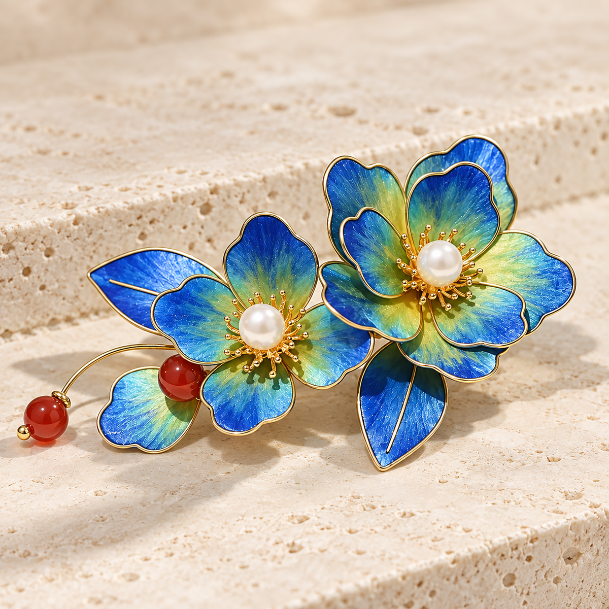 Blue green blossom hair clip on a textured stone step