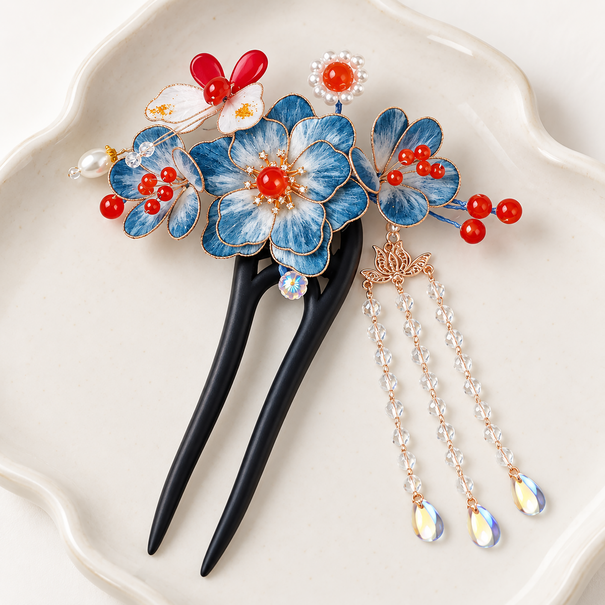 Blue blossom Ronghua hairpin resting on an ivory dish
