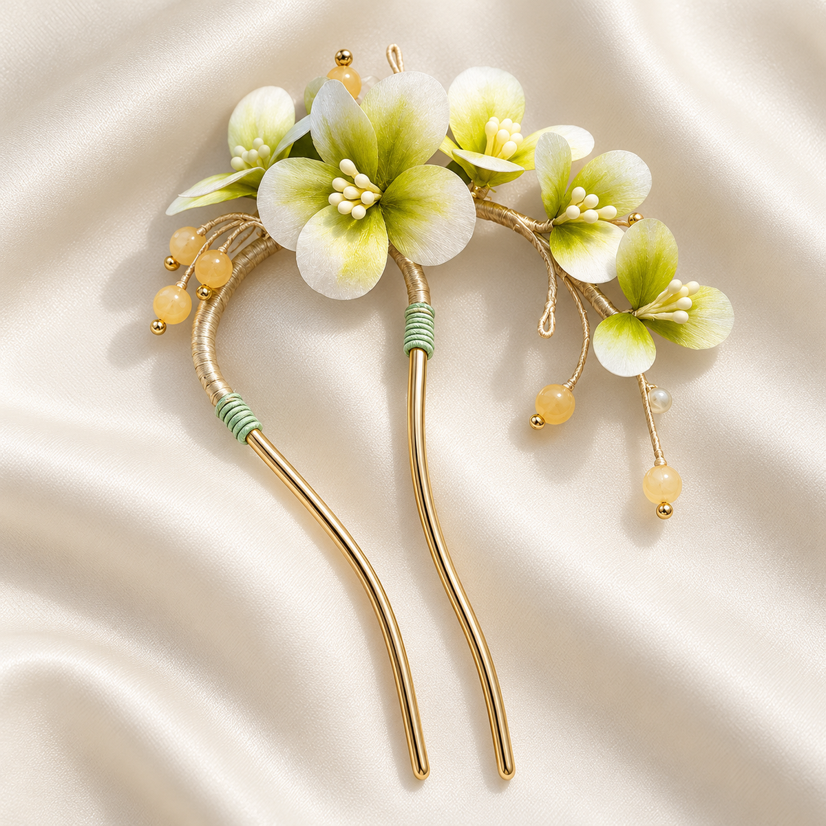 Green blossom hair stick on silk fabric