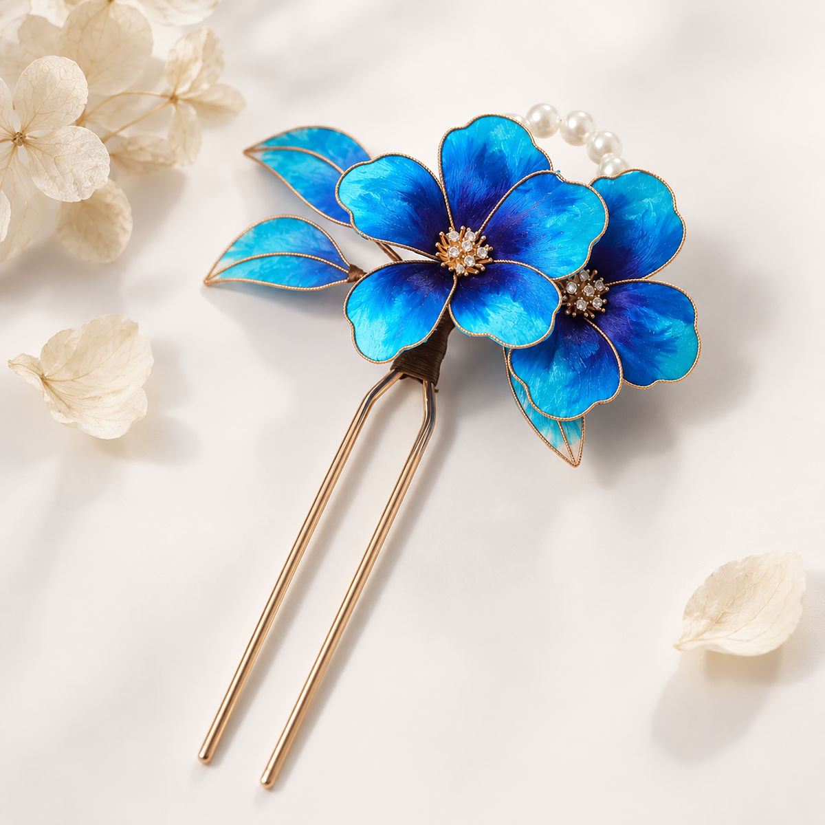 Blue silk Ronghua U-shaped hairpin with pearl-like accents on cream fabric