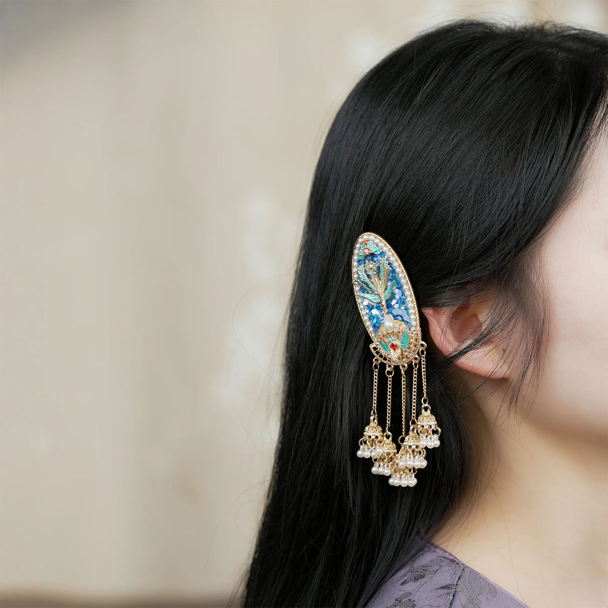 Handcrafted Ronghua earrings worn in contemporary styling