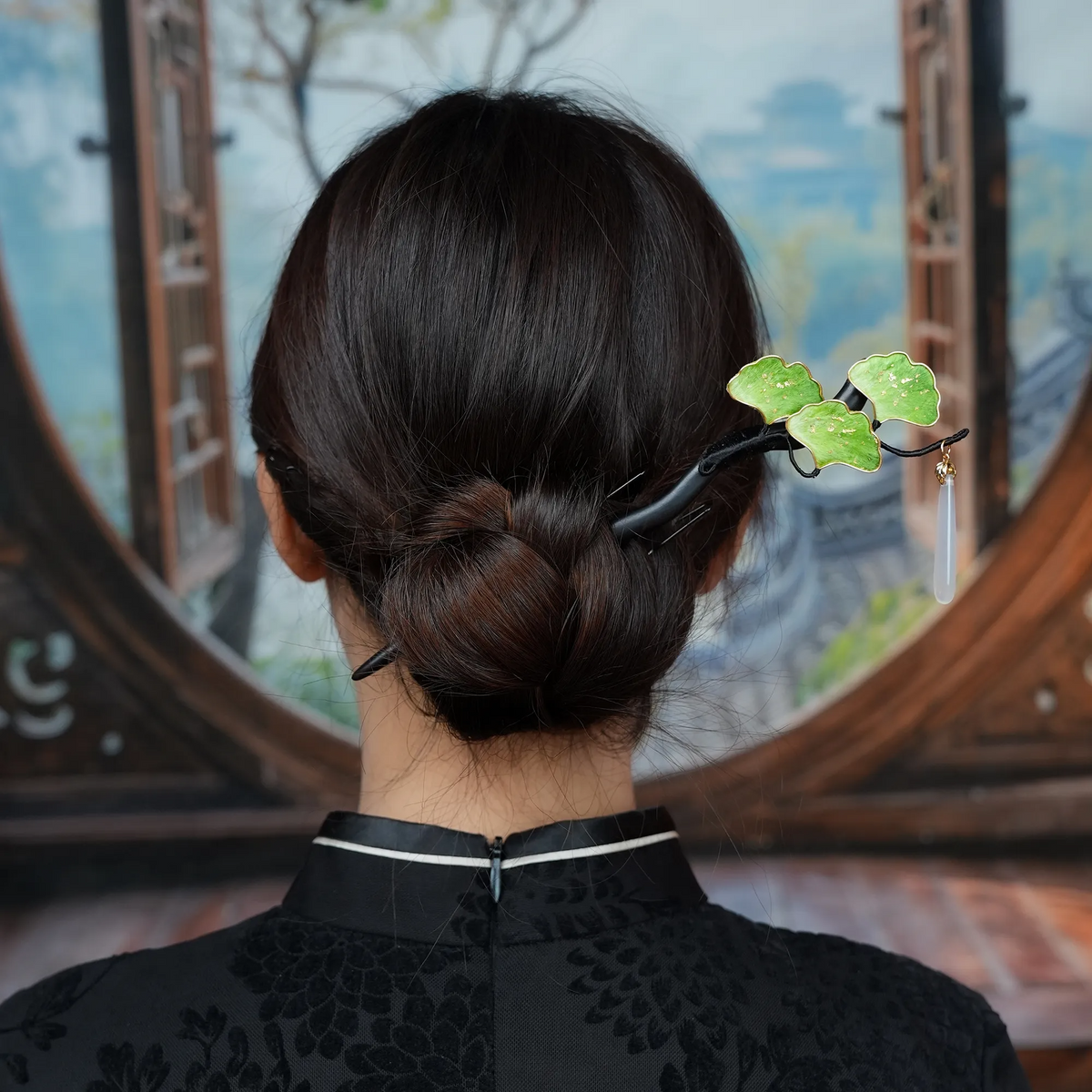 Back view of Green Ginkgo Ronghua Hairpin worn in a low bun