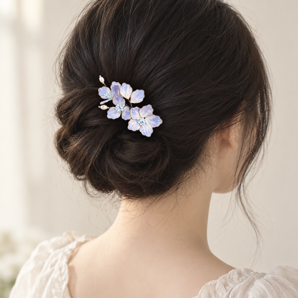 Lavender silk Ronghua hair clip worn in a low bun