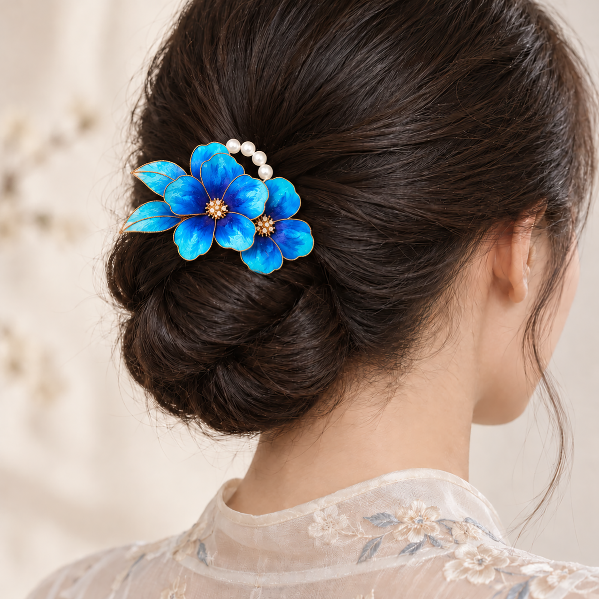 Blue porcelain Ronghua hairpin worn in a low bun