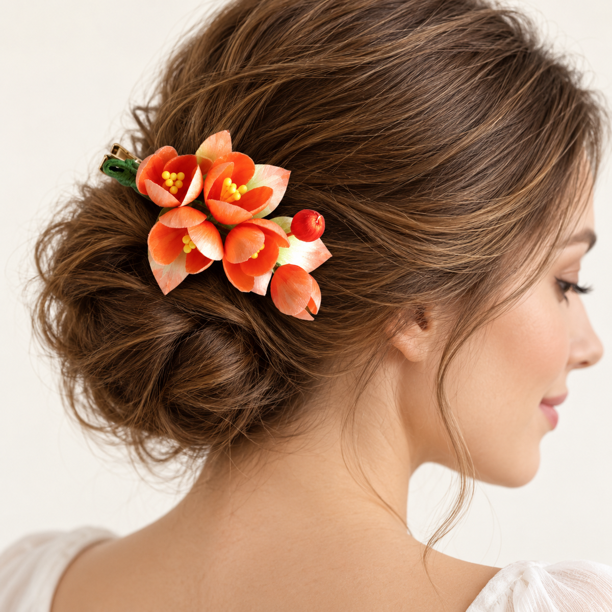 Orange blossom Ronghua hair clip worn in a bun