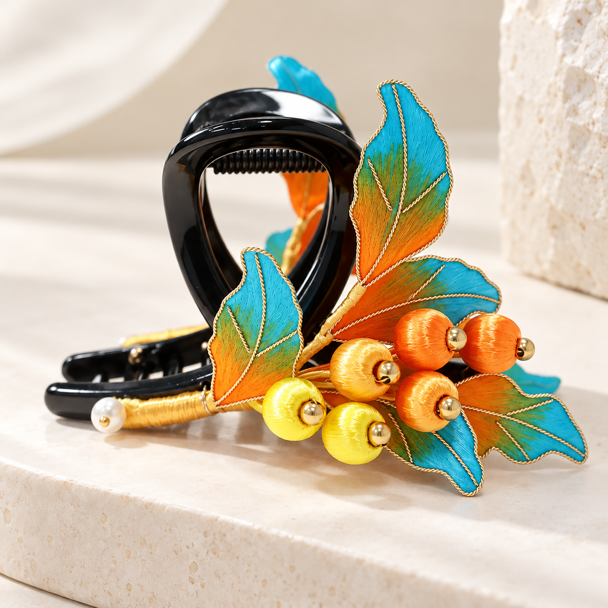 Autumn fruit mulberry-silk Ronghua claw hair clip on stone surface