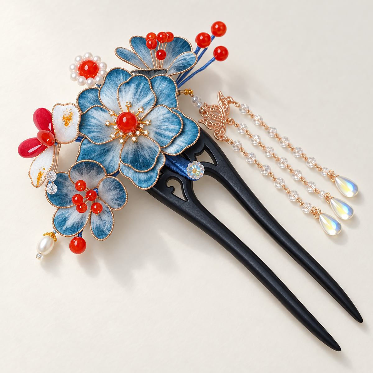 Angled view of the two-prong hairpin with blue Ronghua blossoms and beaded tassel