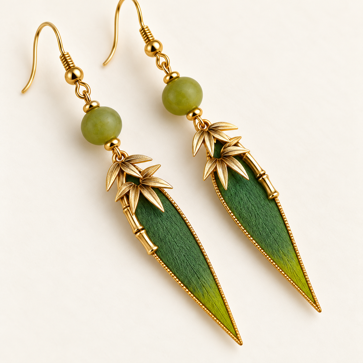 Green bamboo leaf earrings close-up of filigree and bead