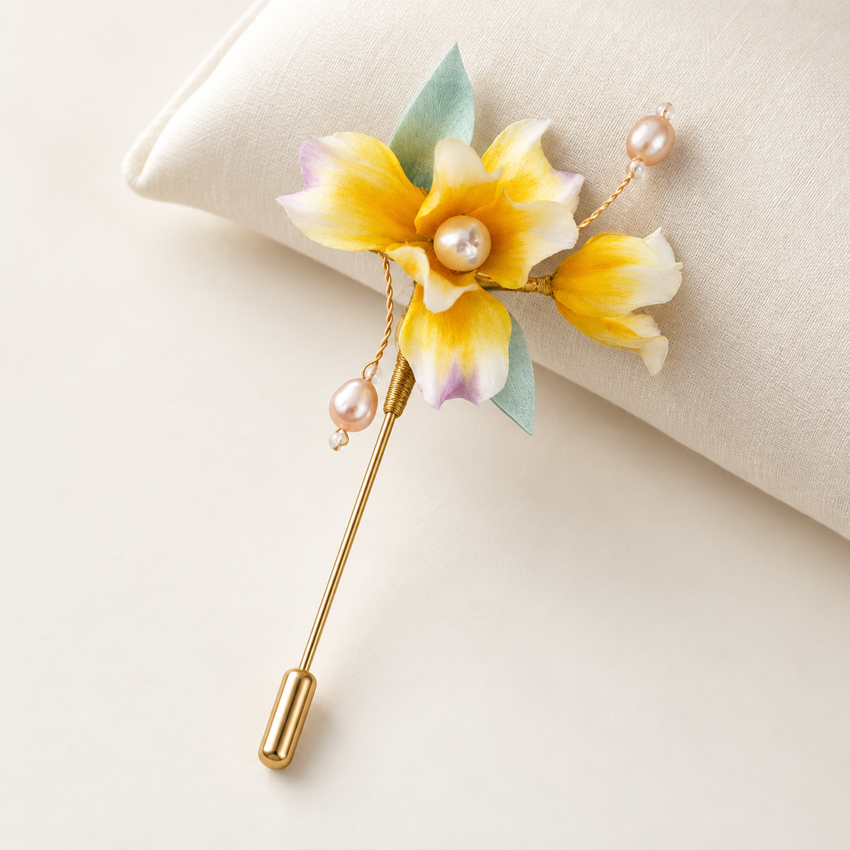Yingxia yellow iris brooch close-up of bloom and pearl drops