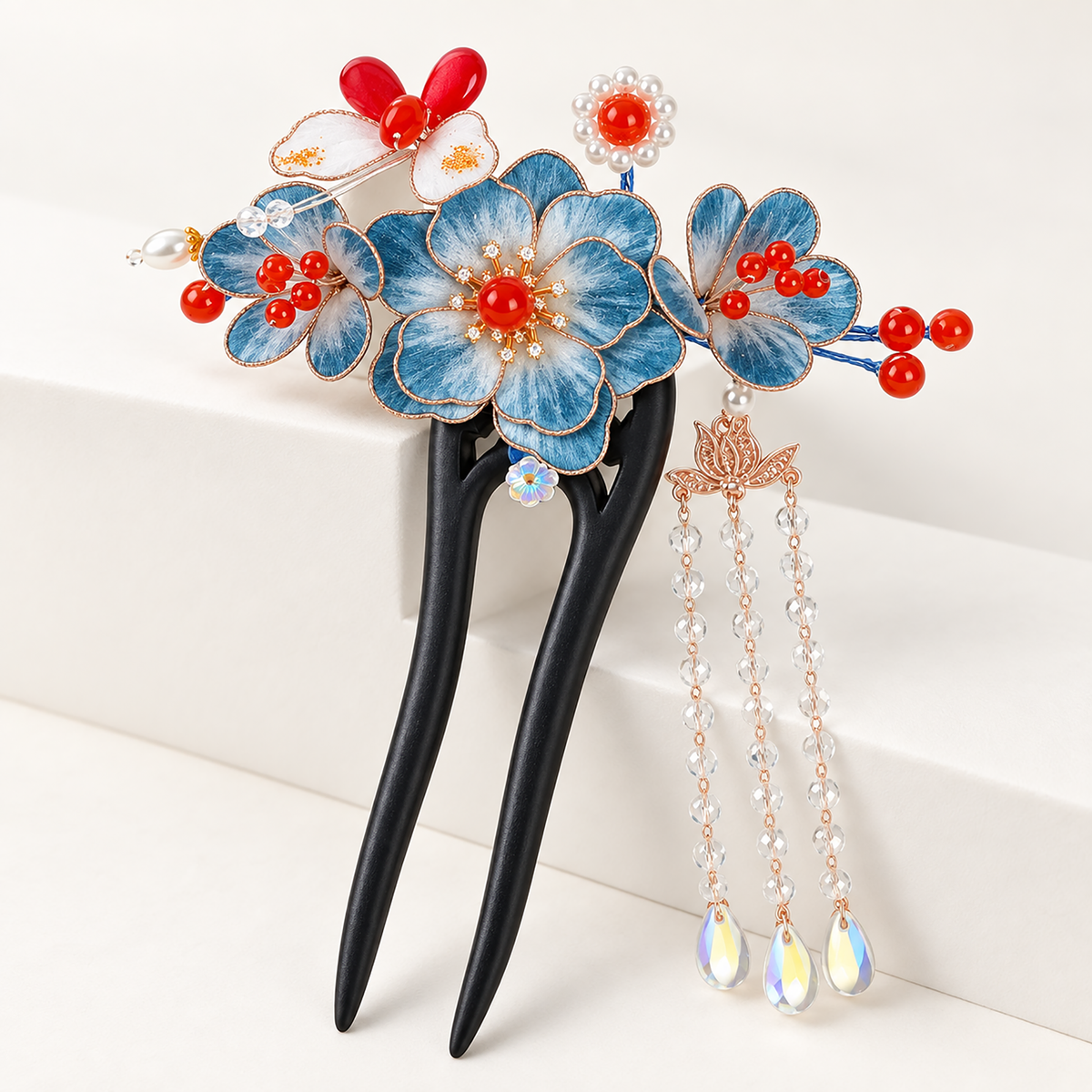 Front view of blue Ronghua blossoms with red bead accents and tassel