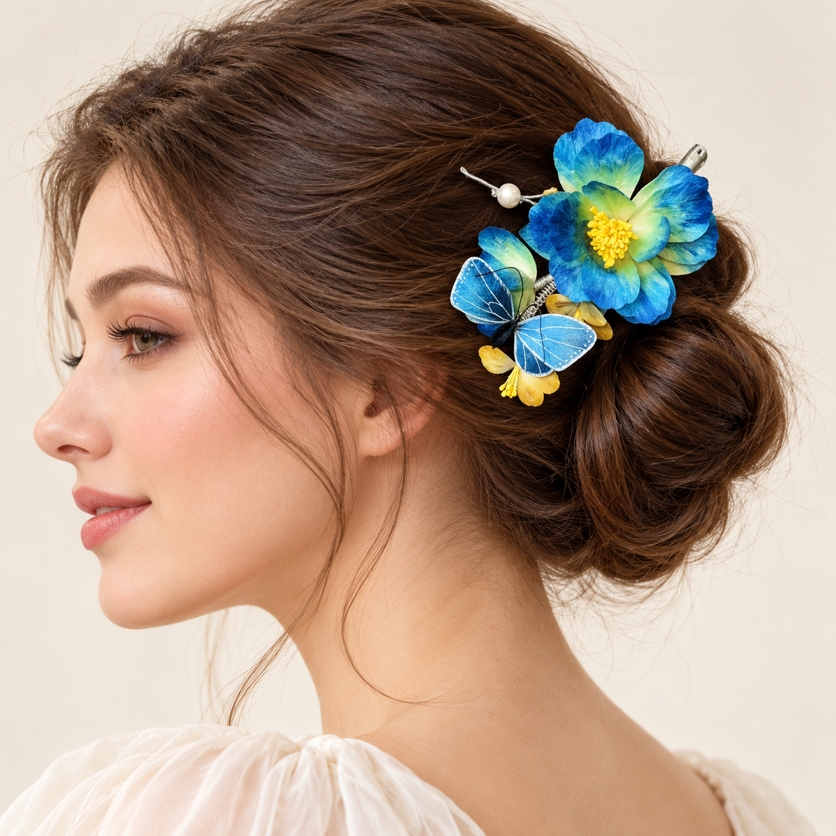 Blue blossom butterfly hair clip worn in an updo