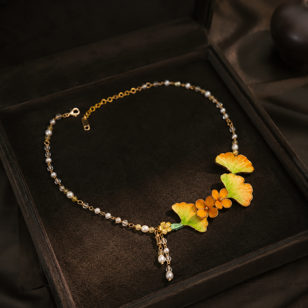 Detail of handmade green silk texture and metal findings
