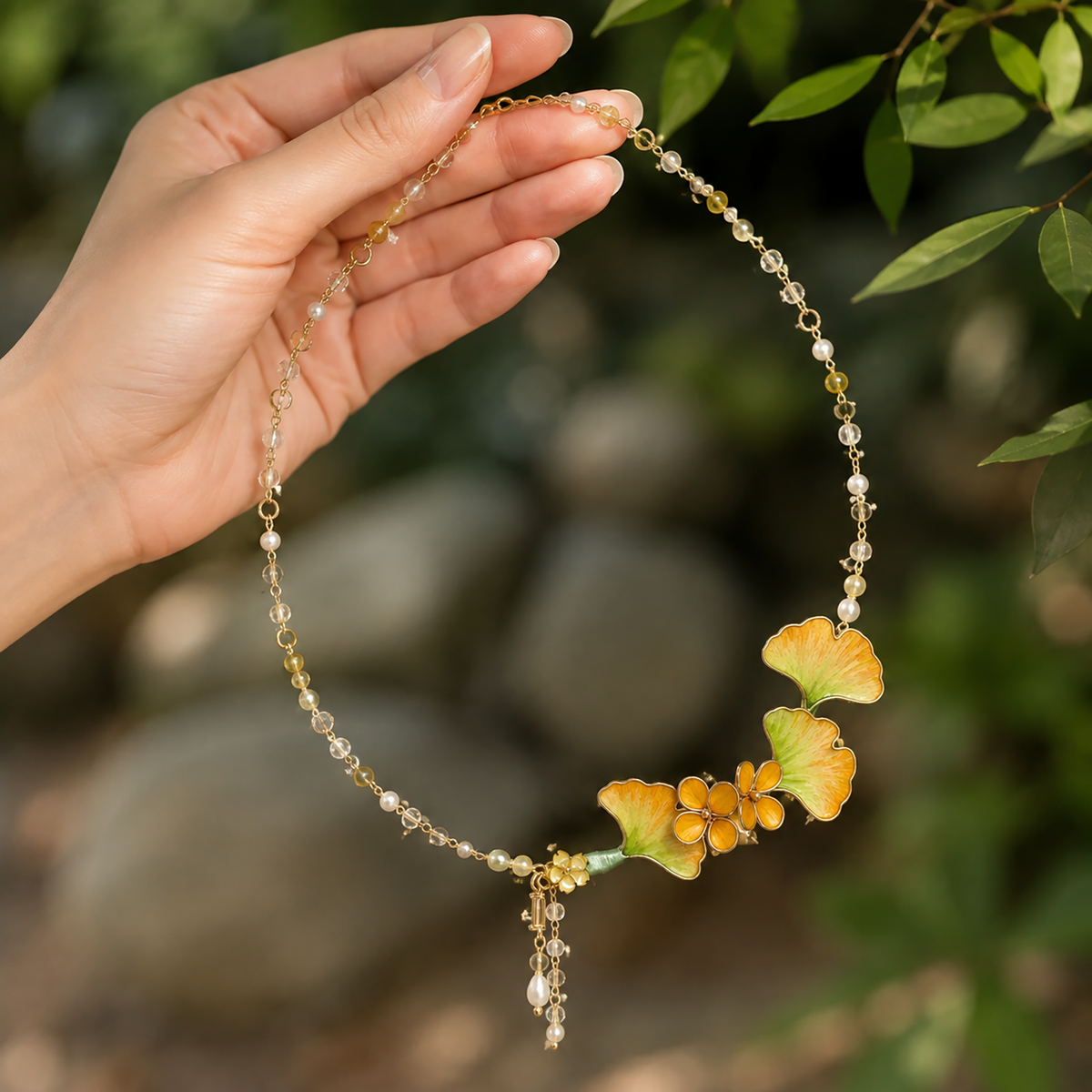 Ginkgo leaf pearl necklace presented in CLMADE gift packaging