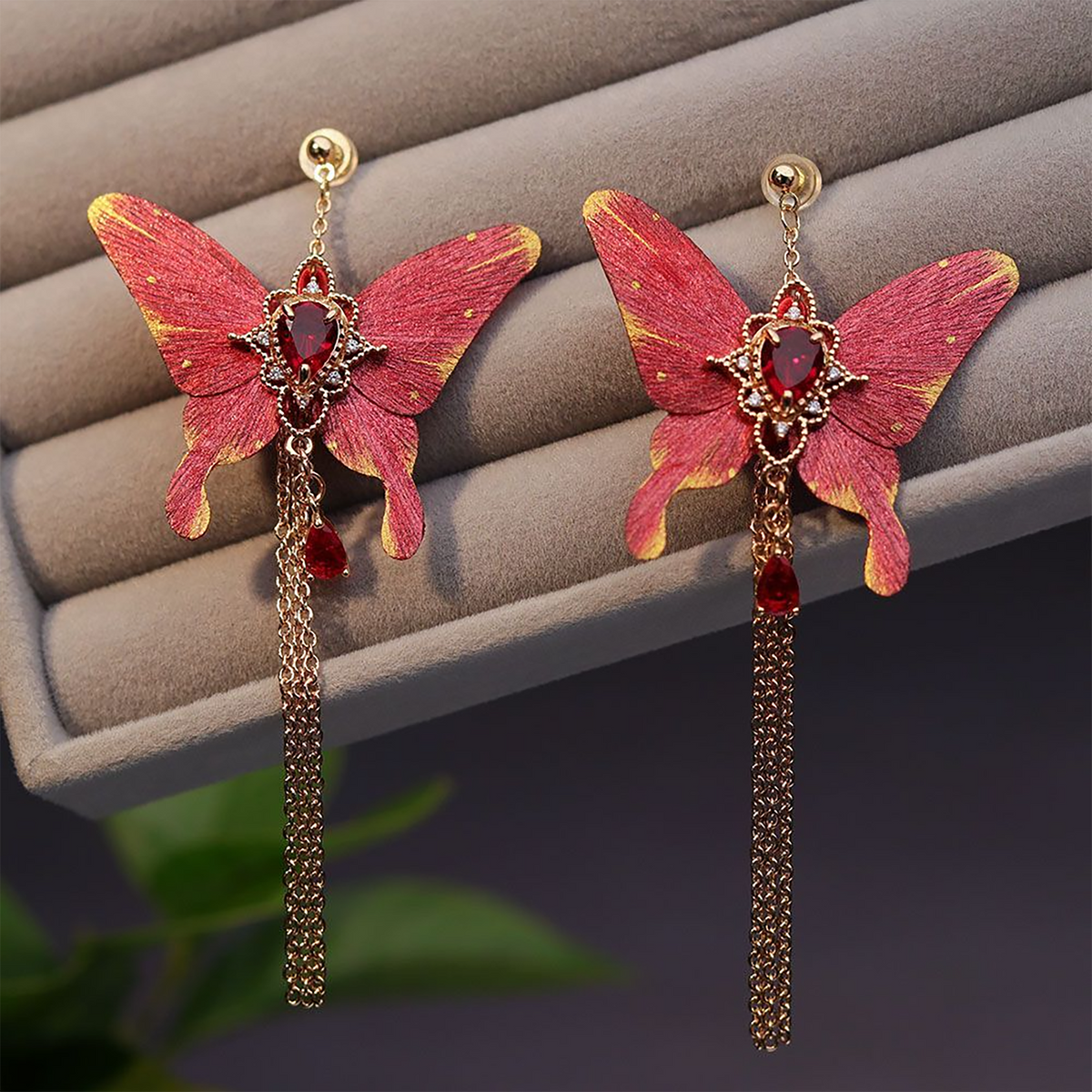 Red butterfly silk velvet tassel earrings with crystal accents and gold-toned chains
