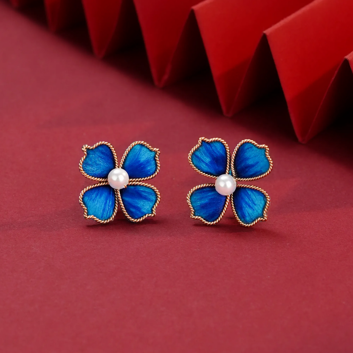 Front view of Blue Four-Leaf Clover Ronghua Stud Earrings