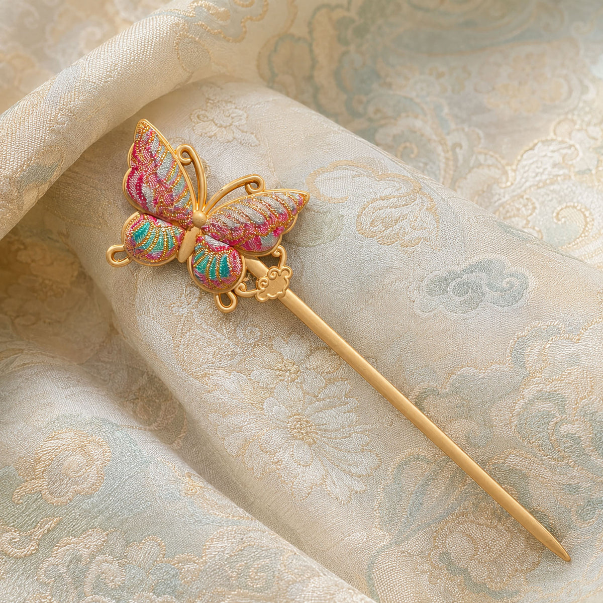 Close-up of Song Brocade showing structured weave, layered colour and patterned detail