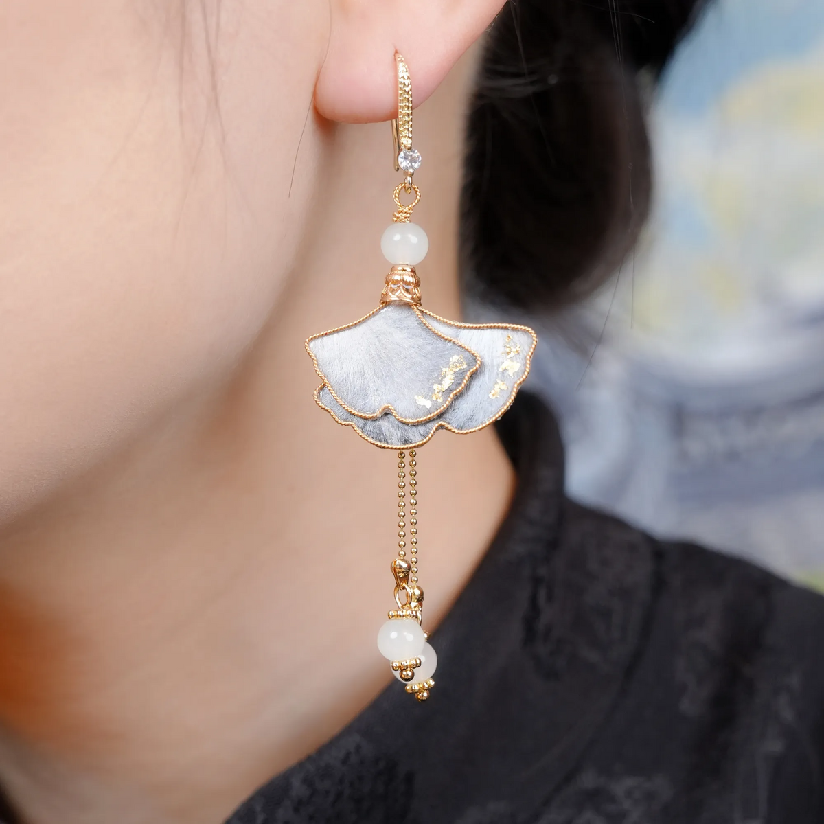 Silver Grey Ginkgo Ronghua earring shown worn for scale