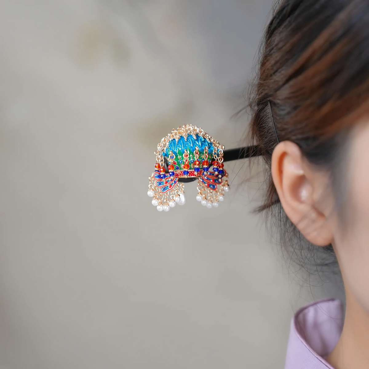 Nine Dragons Nine Phoenixes Crown Hairpin worn in the hair