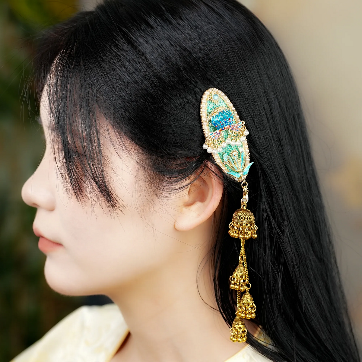 Nine Dragons and Nine Phoenixes Hair Clip on a red background