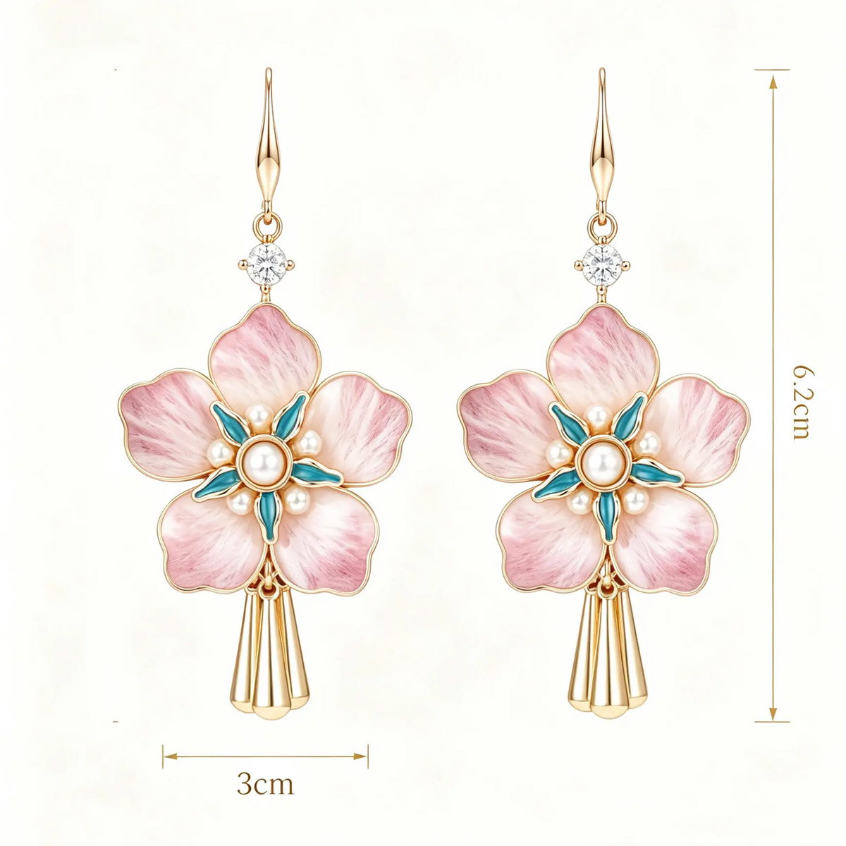 Five-petal pink silk blossoms with teal centres and gold-tone tassels size guide showing 6.2 by 3 cm