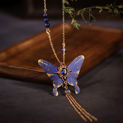 Red butterfly mulberry silk Ronghua tassel necklace by CLMADE, handcrafted with delicate silk details and Eastern-inspired styling.
