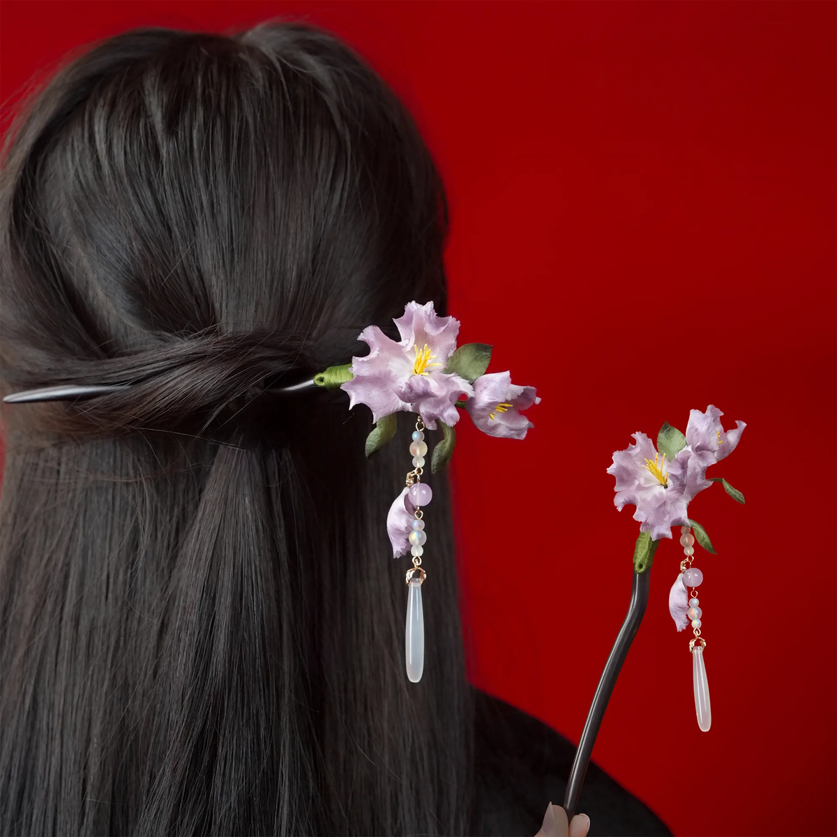 Purple Iris Ronghua Hairpin worn in a bun